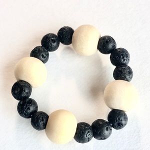 Women’s black and beige ring